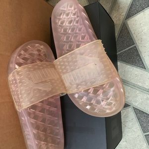 Puma x Fenty jelly slides.